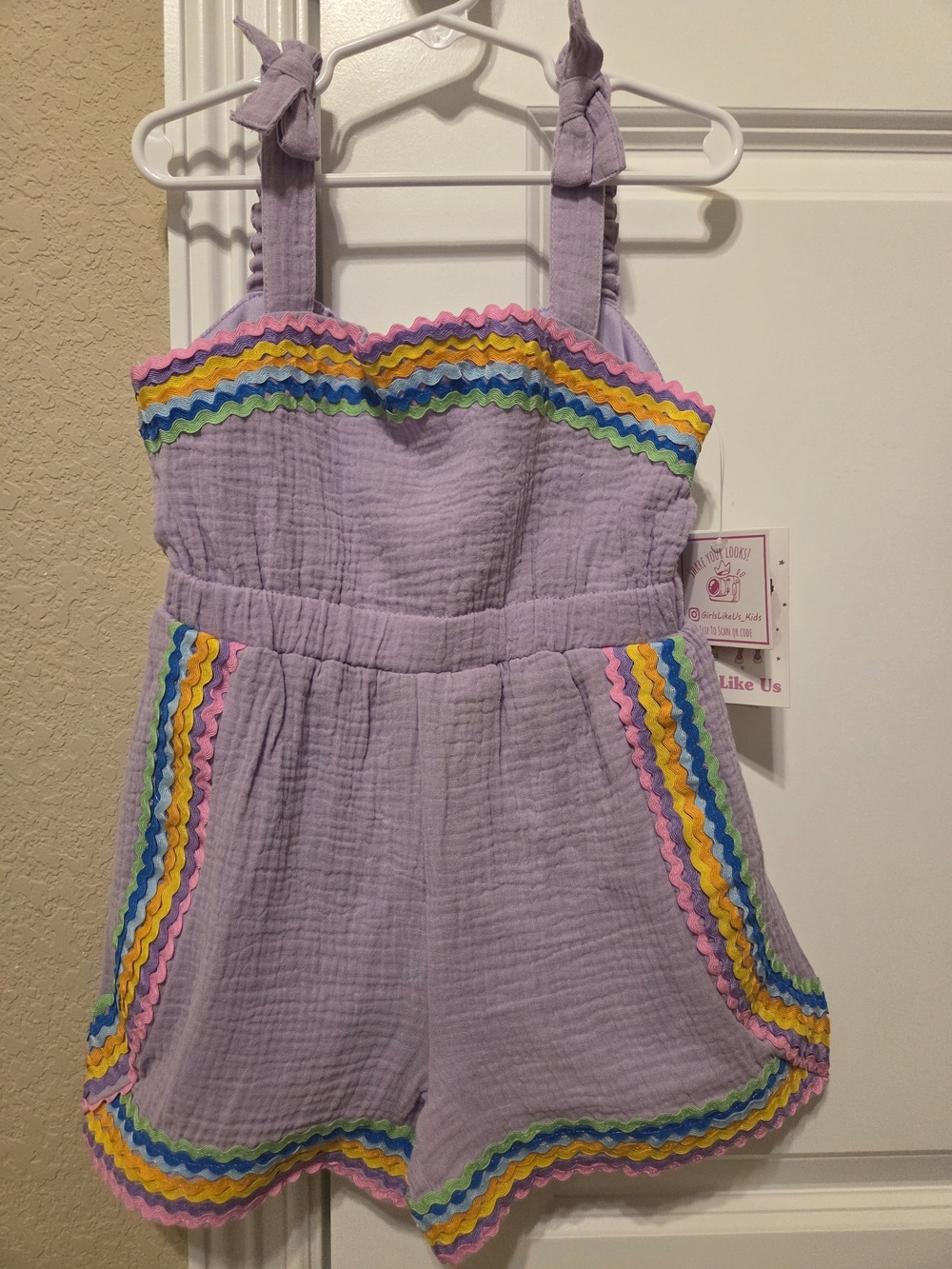 Lavender Rainbow Trim Girls' Romper with Bow Tie Straps